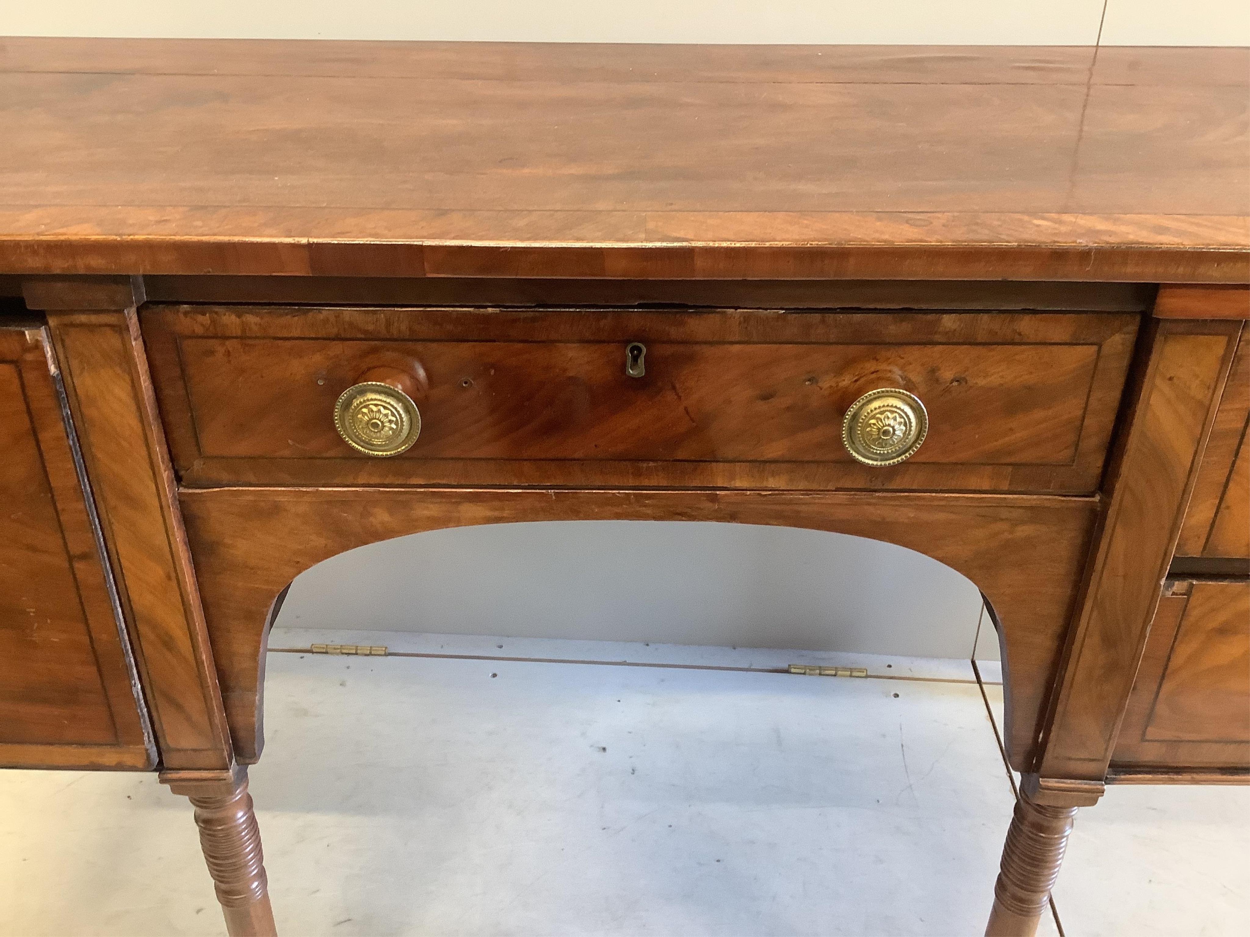 A Regency mahogany sideboard, width 137cm, depth 60cm, height 84cm. Condition - poor